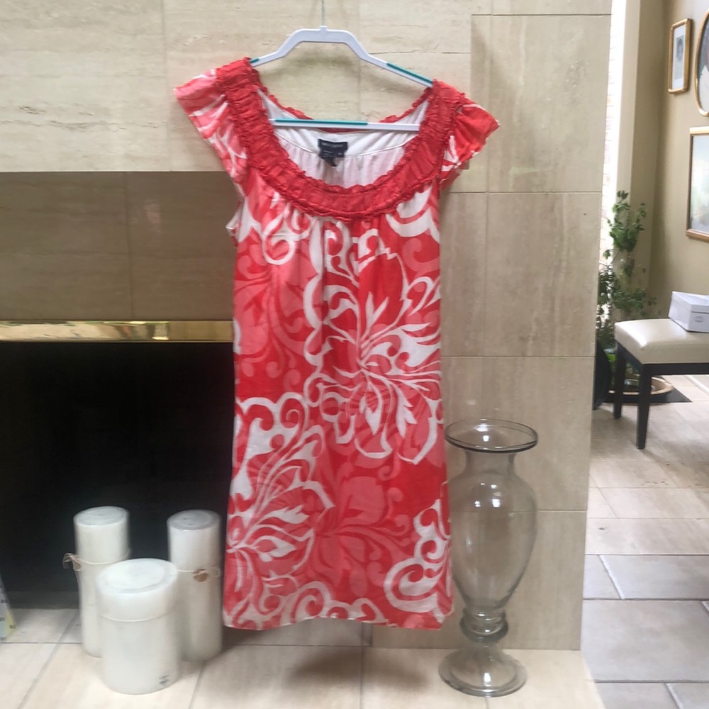 - Coral and cream cotton dress